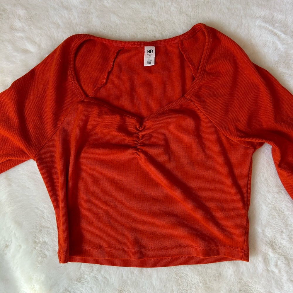 Orange cropped long sleeve